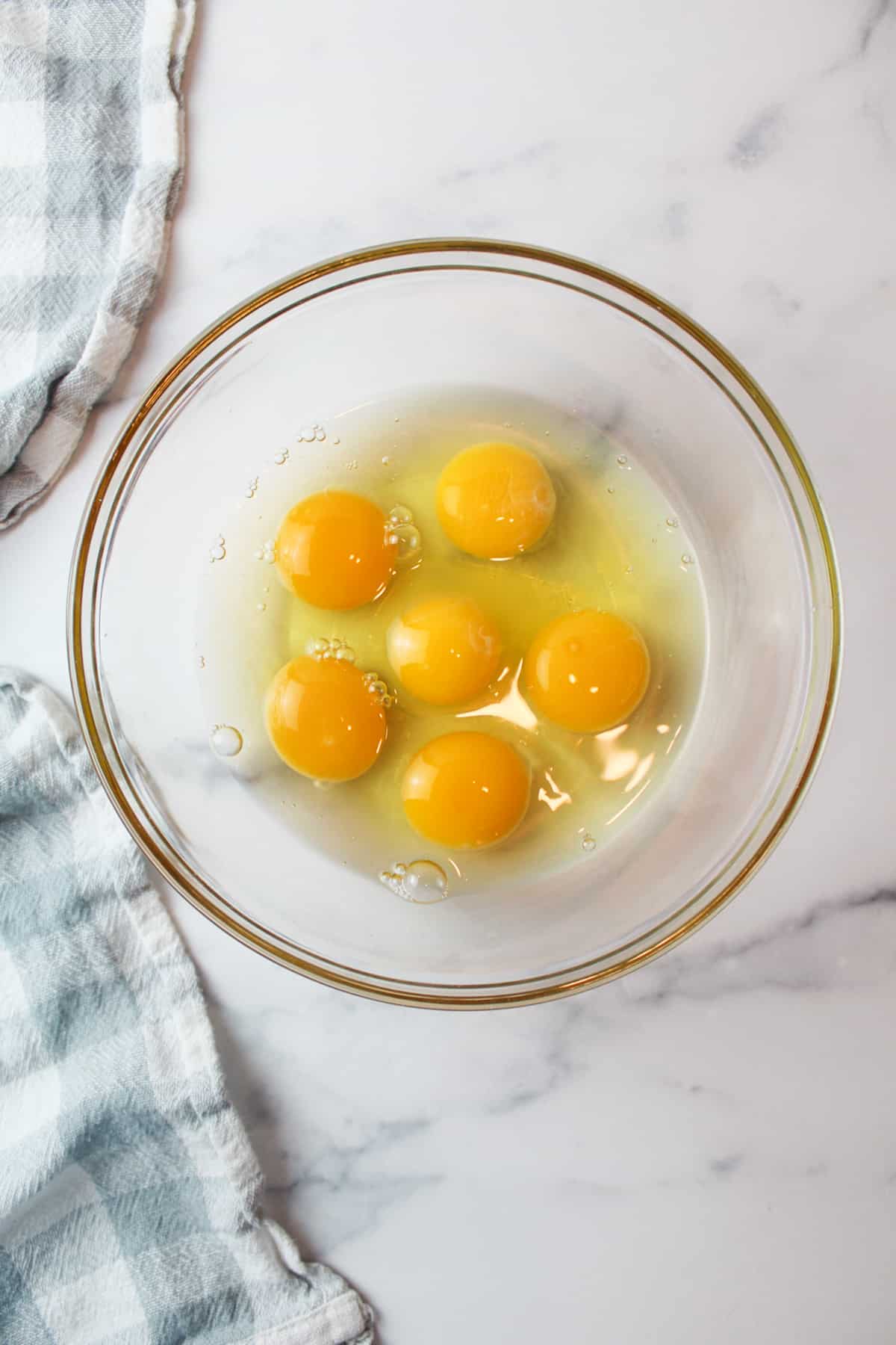 6 eggs in a mixing bowl