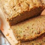 a close angled view of sliced zucchini bread