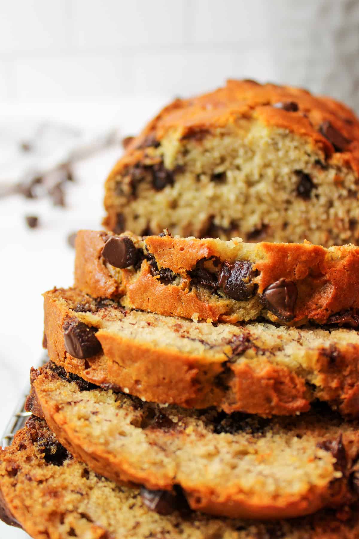 close frontal view of sliced chocolate chip banana bread.