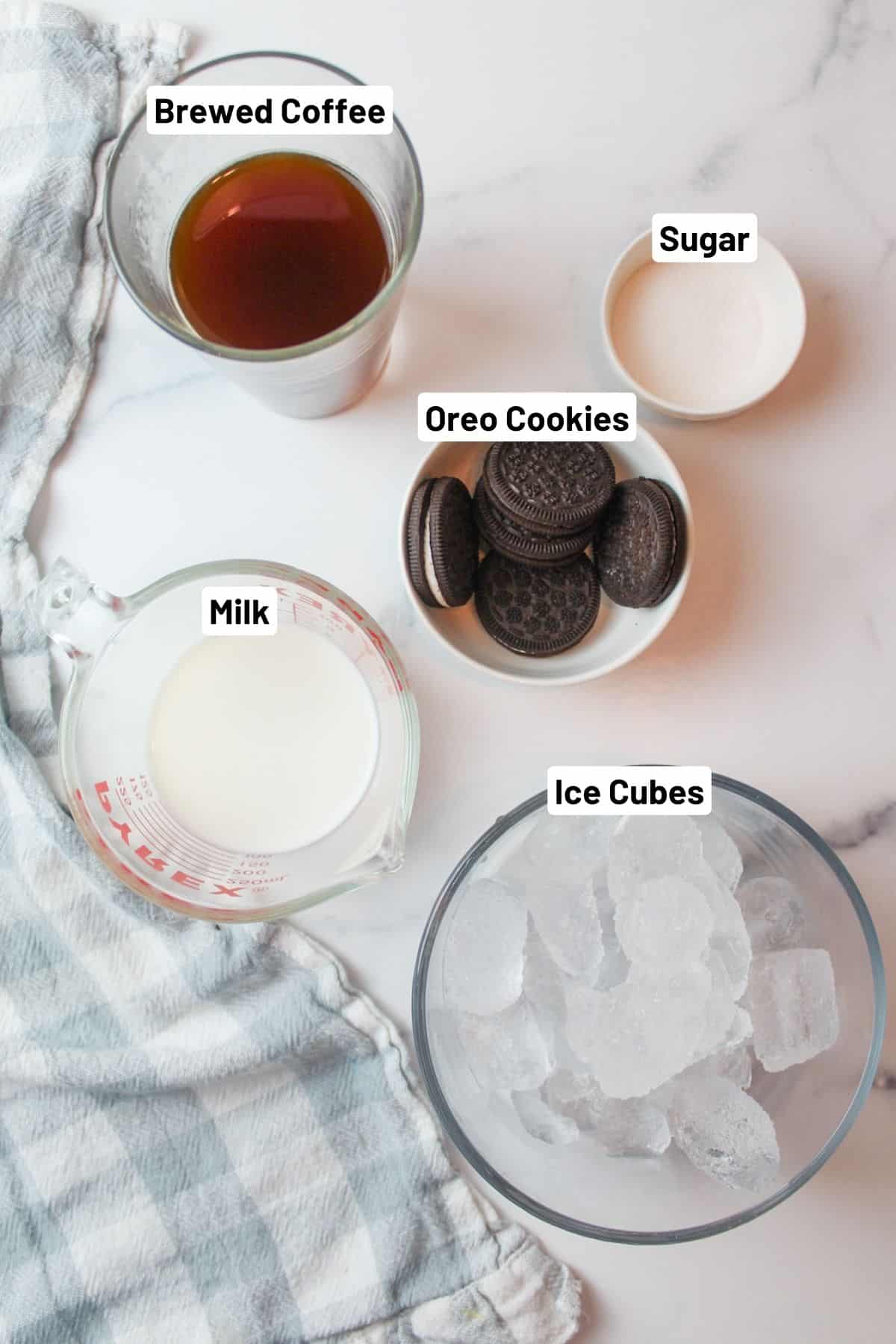 labeled ingredients needed to make oreo iced coffee.