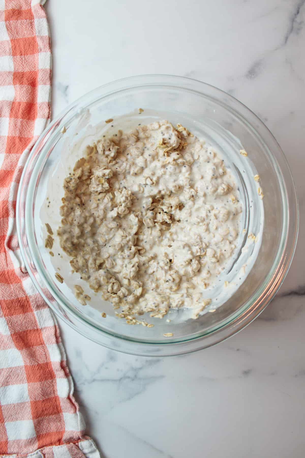 overnight oat mixture in a mixing bowl.