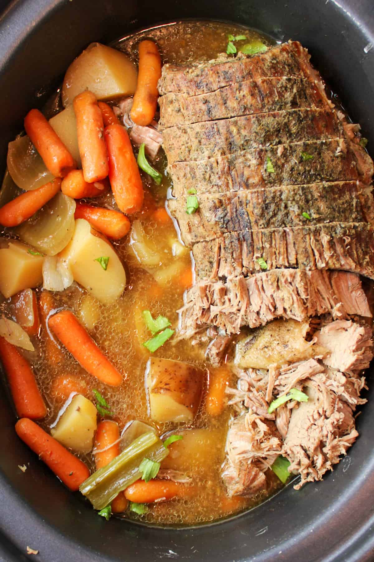 shredded and cut beef roast and veggies.