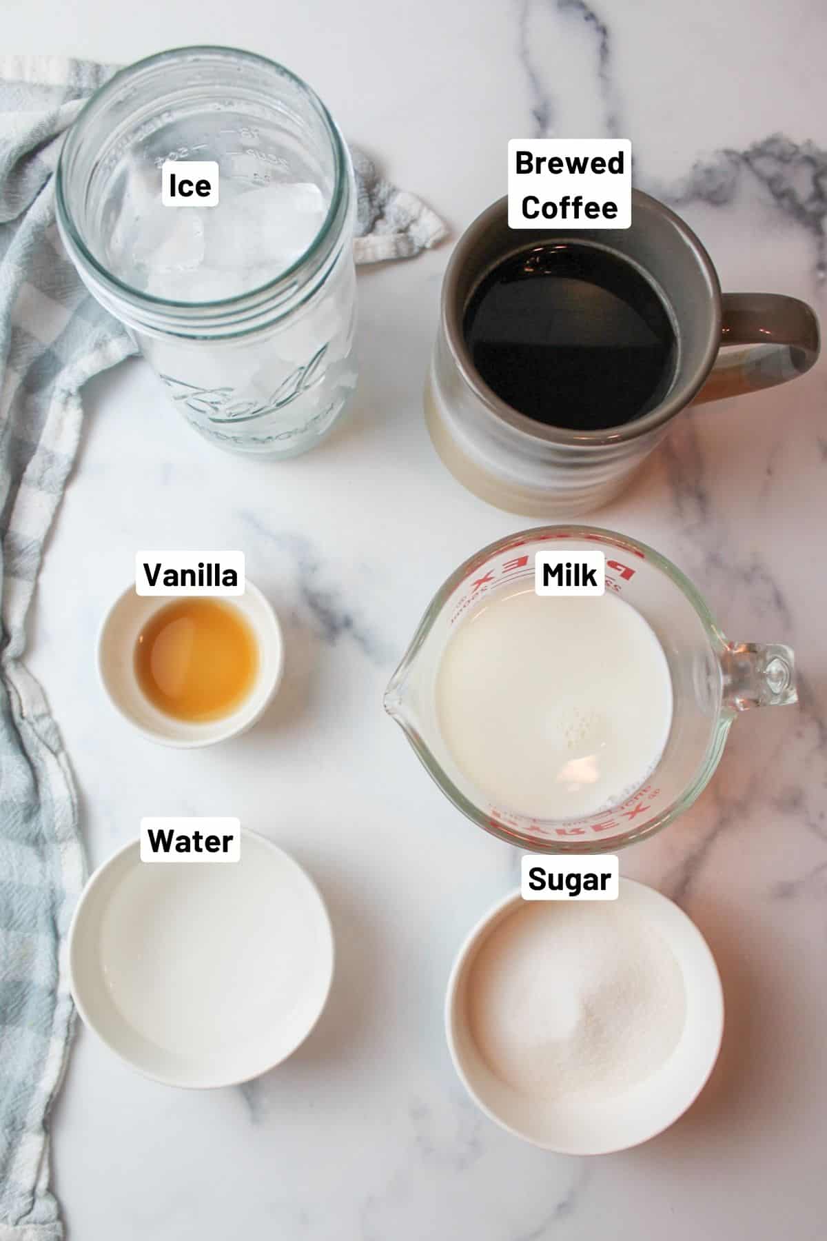 labeled ingredients needed to make vanilla iced latte.