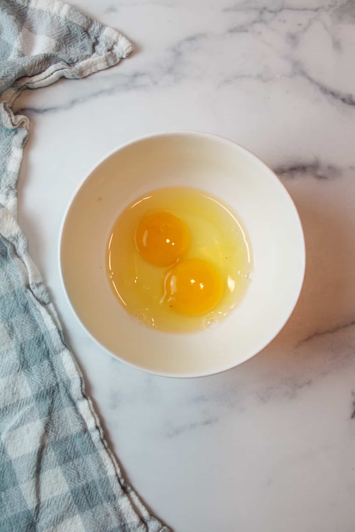 raw eggs in a bowl.