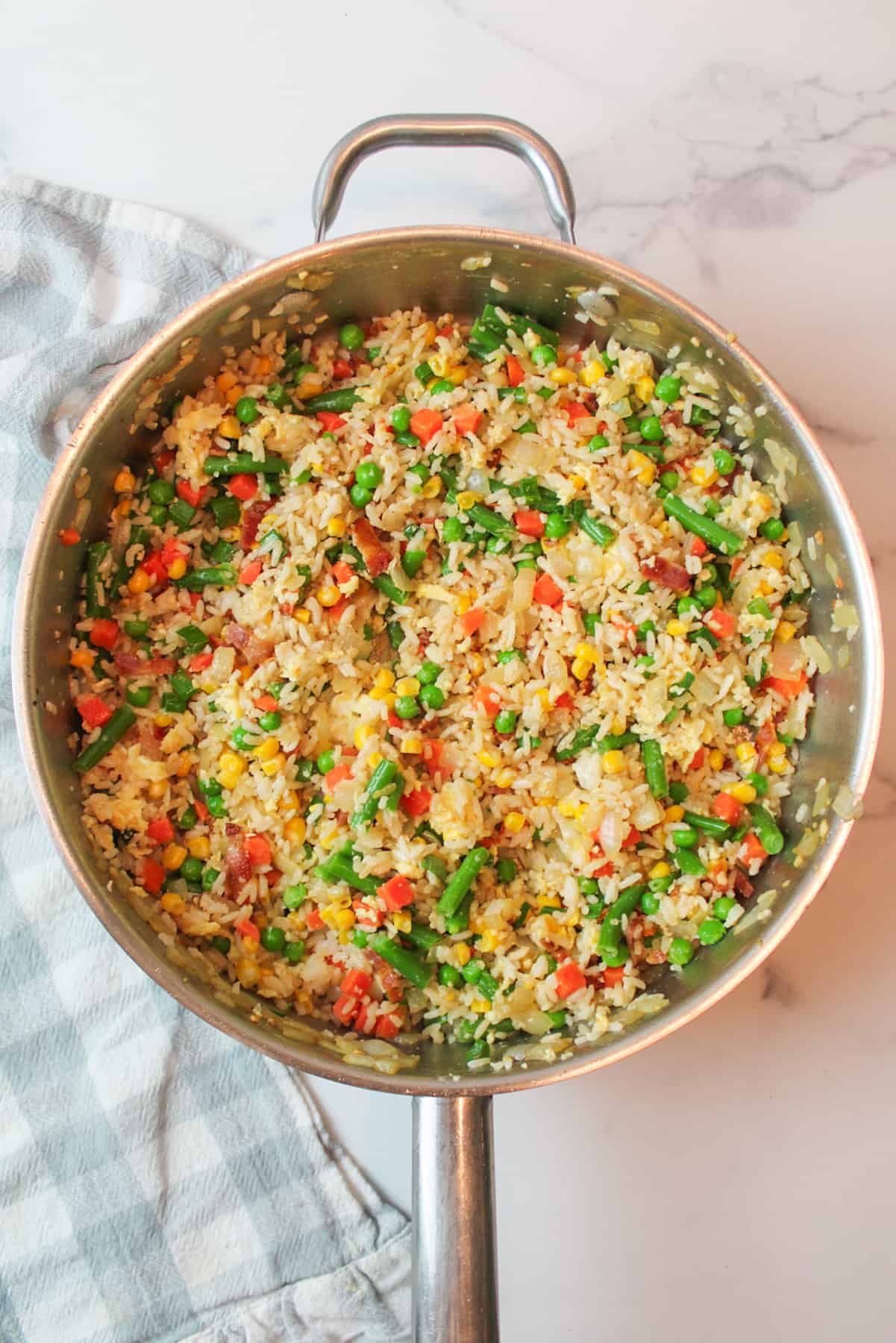 bacon fried rice in a large skillet.