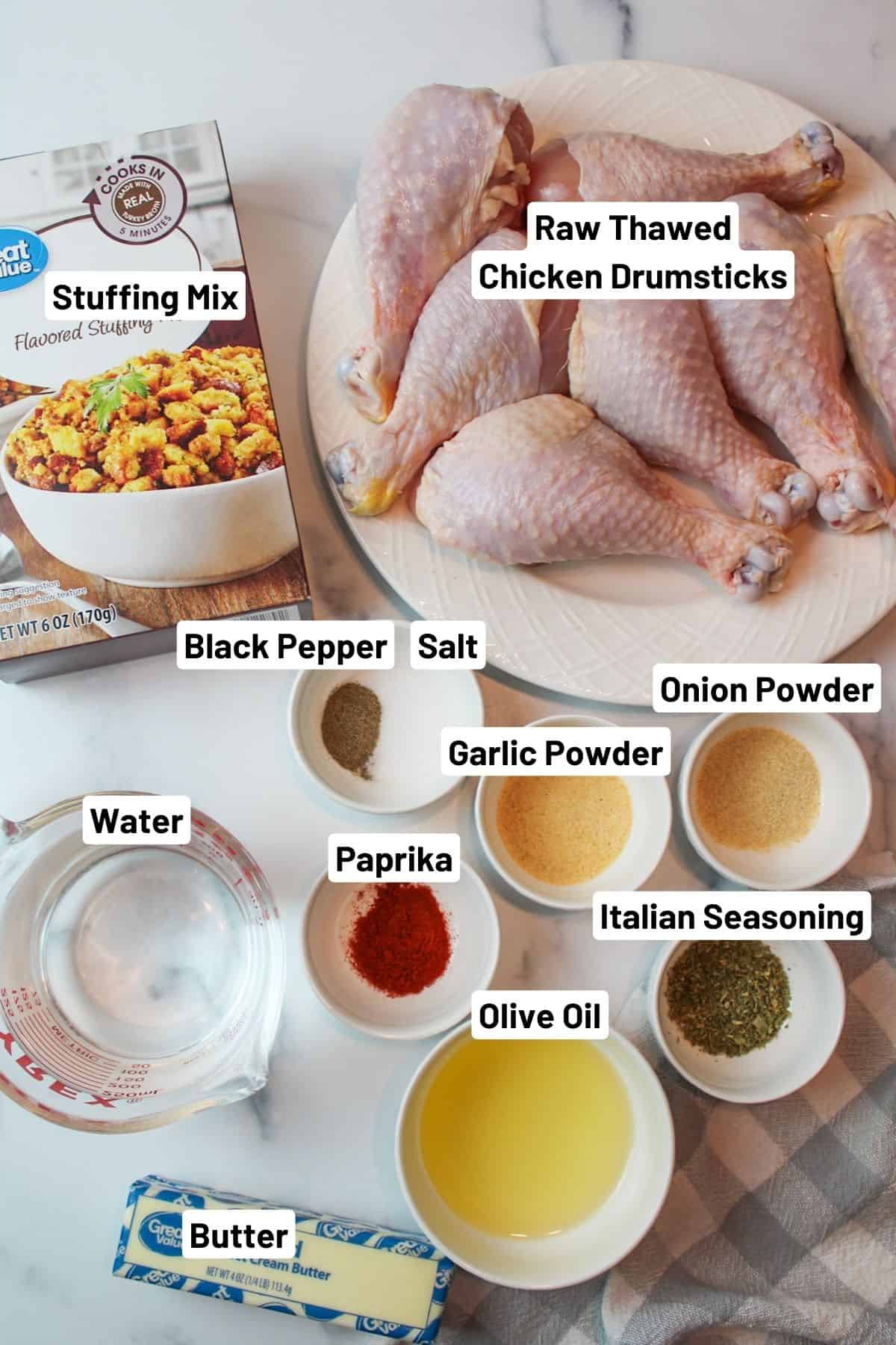 labeled ingredients needed to make stuffed chicken legs.