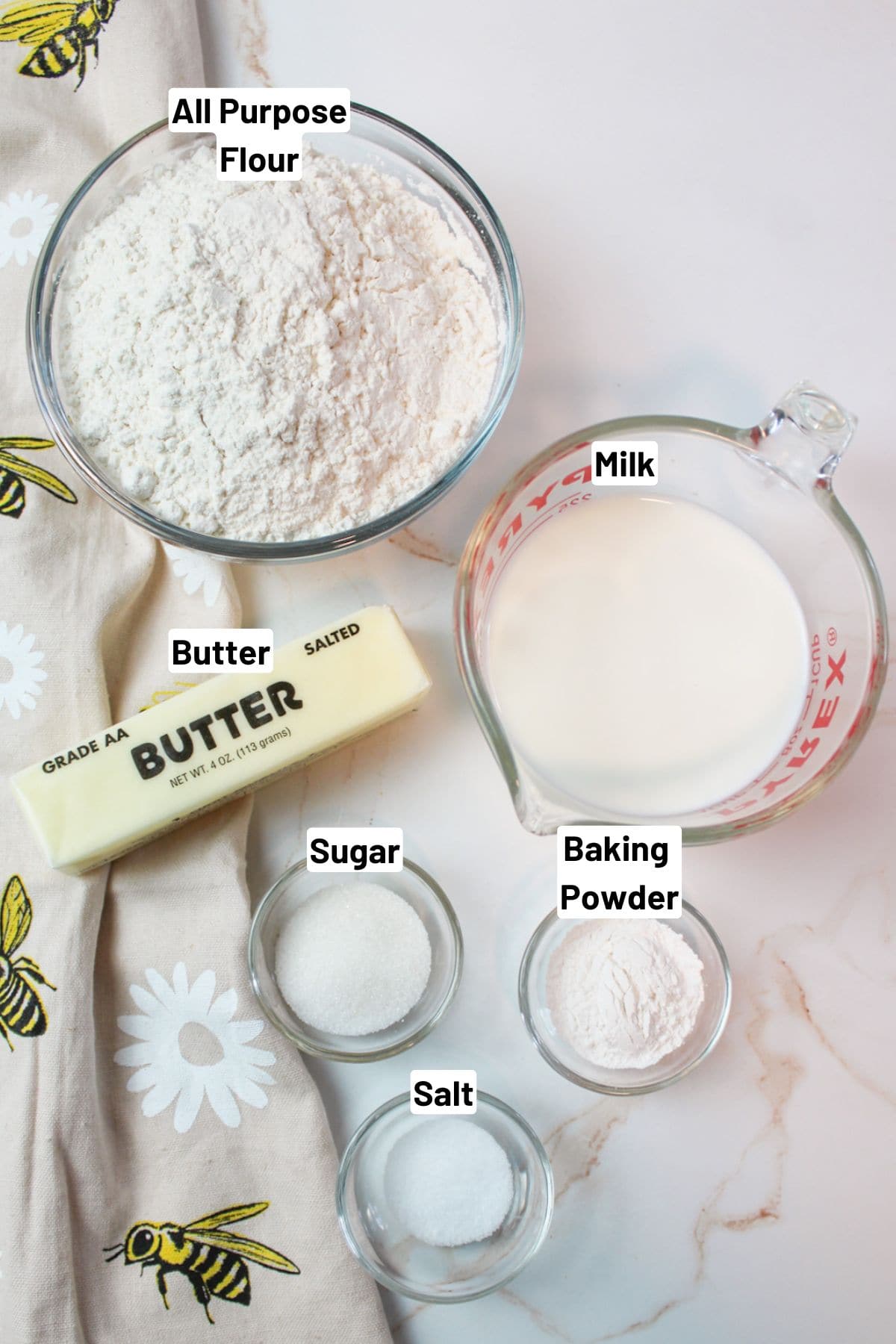 labeled ingredients needed to make baking powder biscuits.