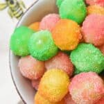 a bowl full of sour patch grapes.