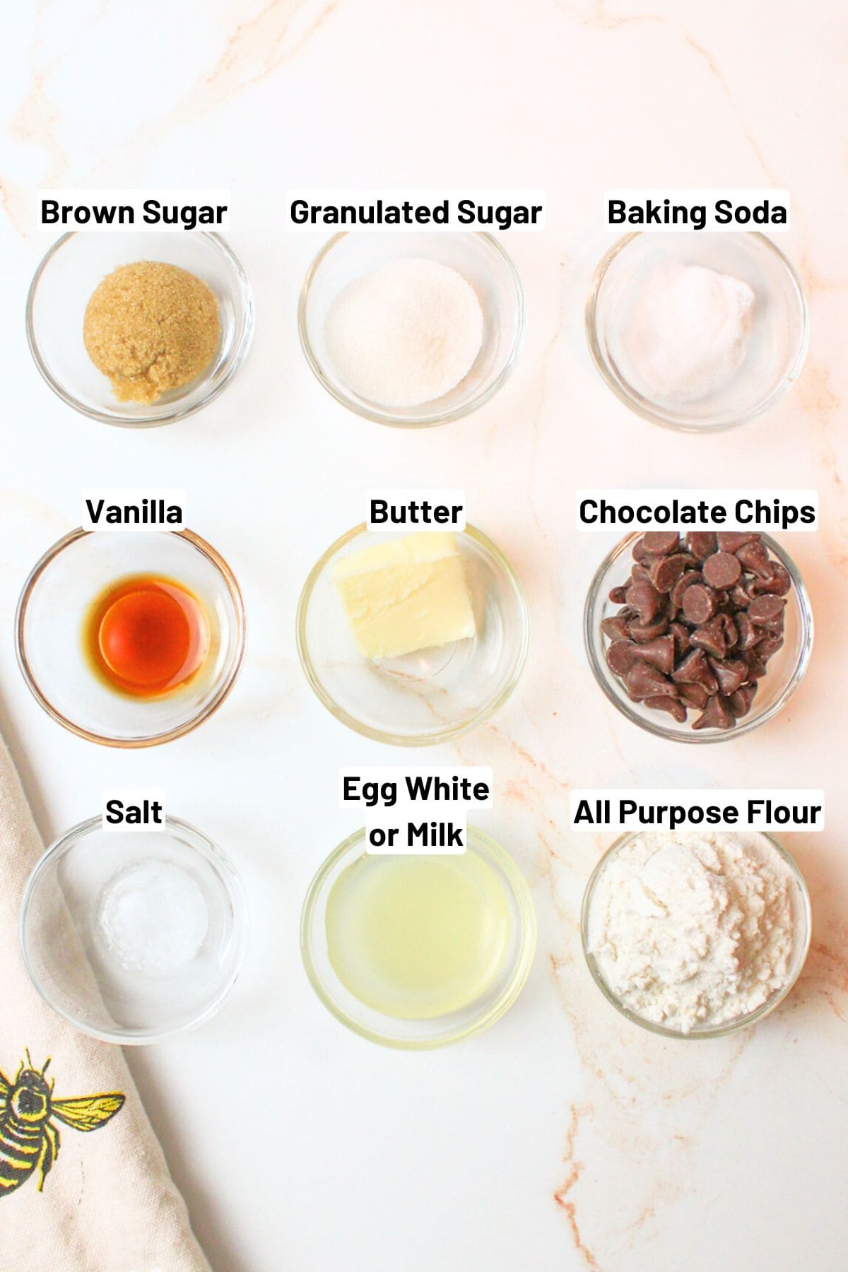 labeled ingredients needed to make single chocolate chip cookie.