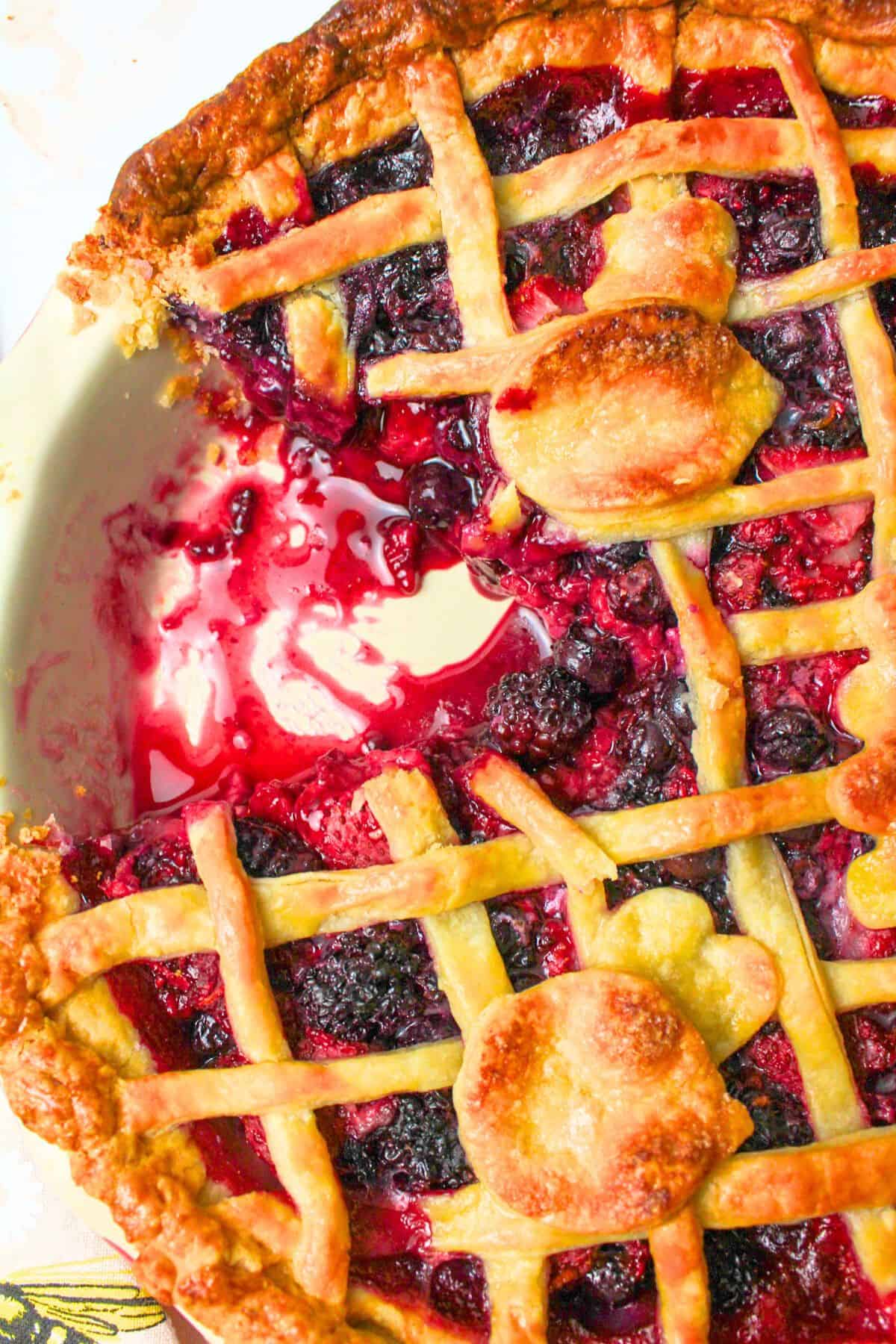 sliced mixed berry pie.