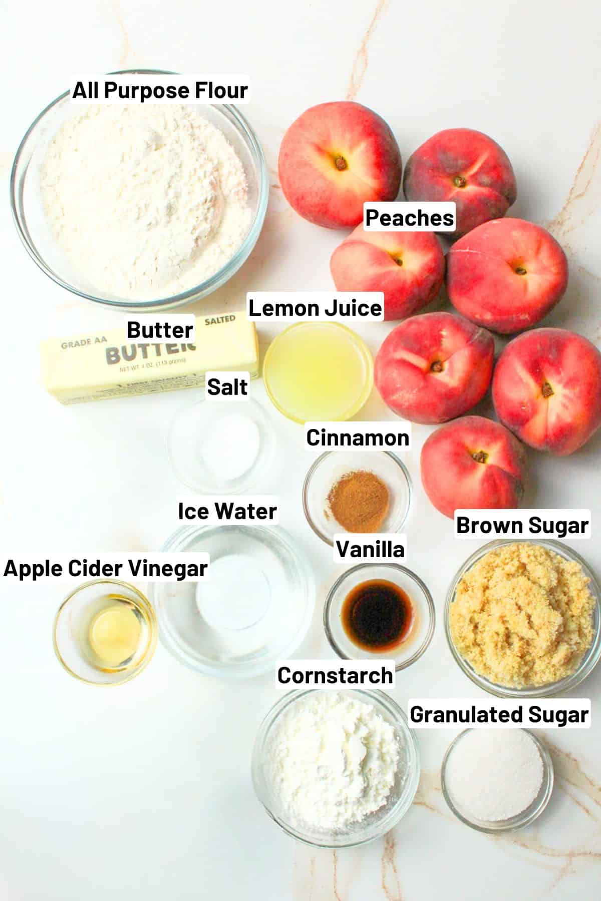 labeled ingredients needed to make peach crumble pie.
