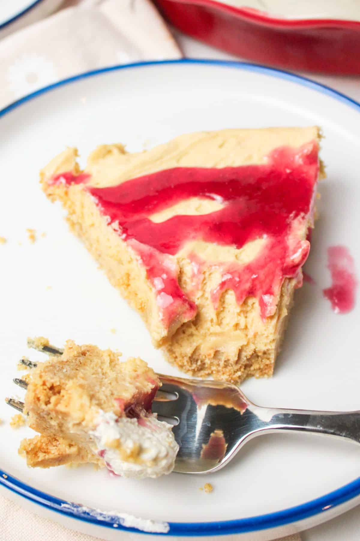 peanut butter jelly pie on a plate with a fork.