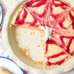sliced peanut butter and jelly pie in a pie plate with some missing.