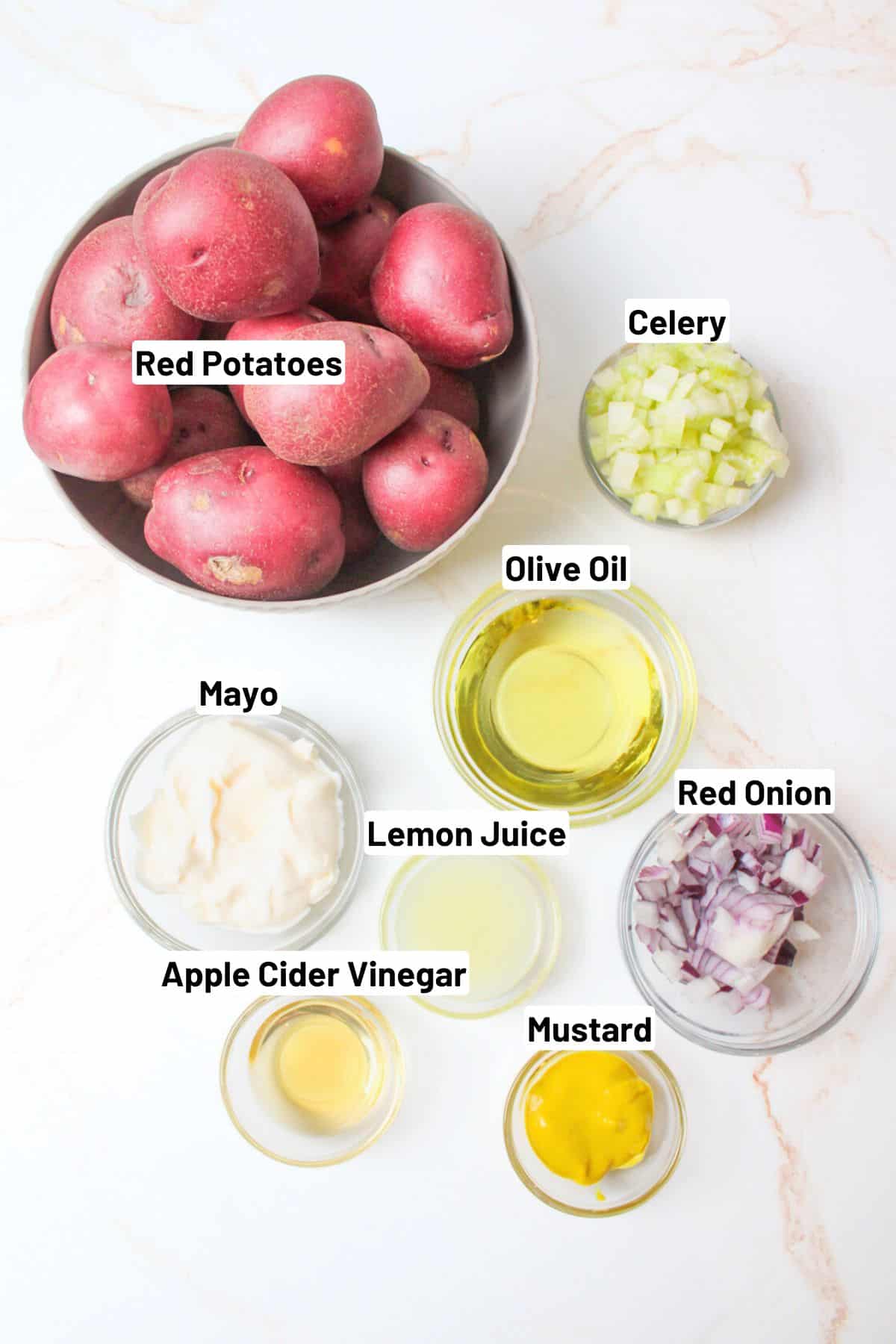 labeled ingredients needed to make red potato salad.