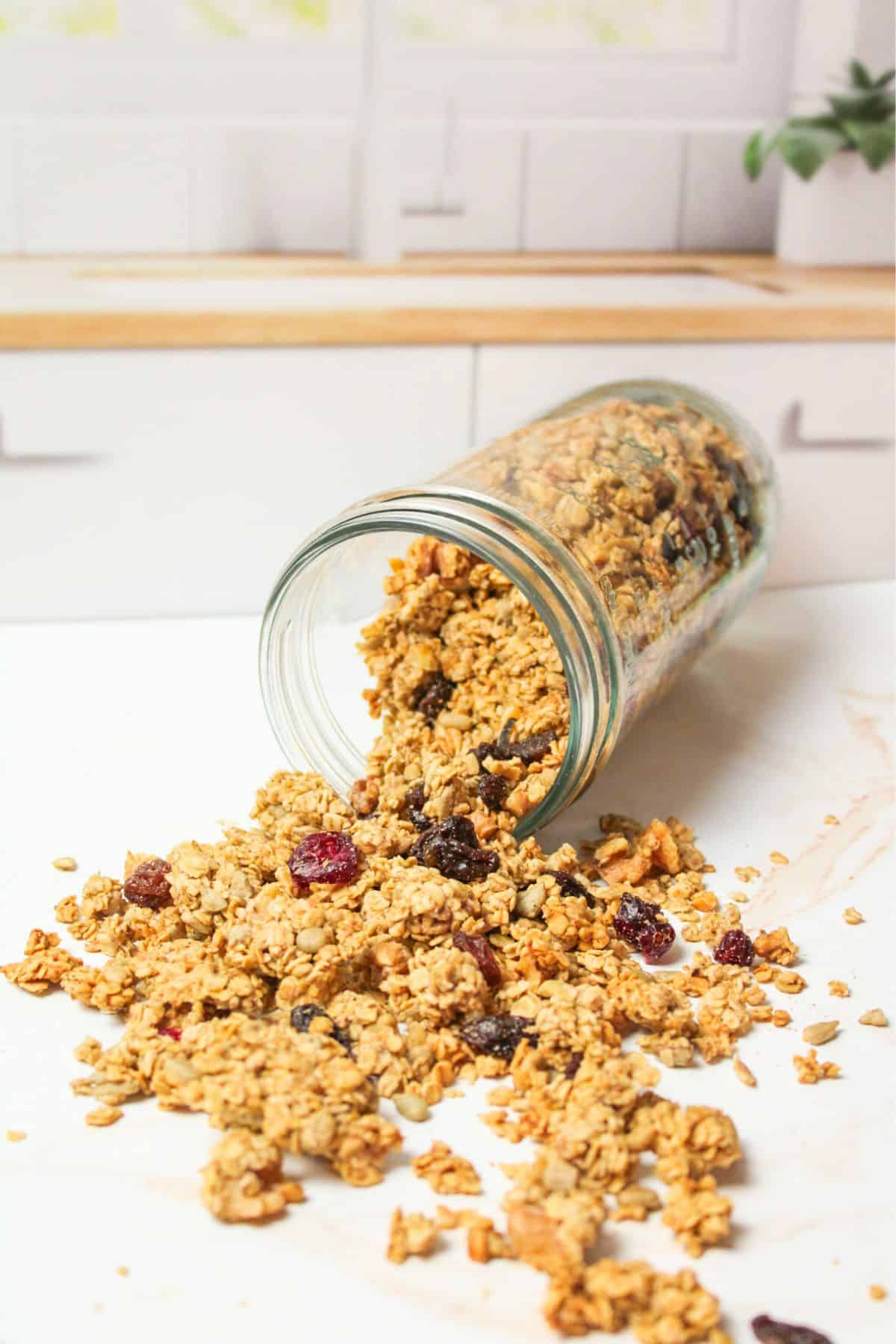 a spilled jar of sourdough granola.
