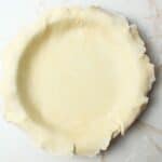 sourdough pie crust in a pie plate.