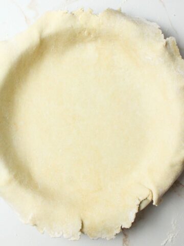 sourodugh pie crust in a pie plate.