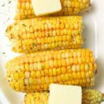 air fried corn on the cob topped with butter.