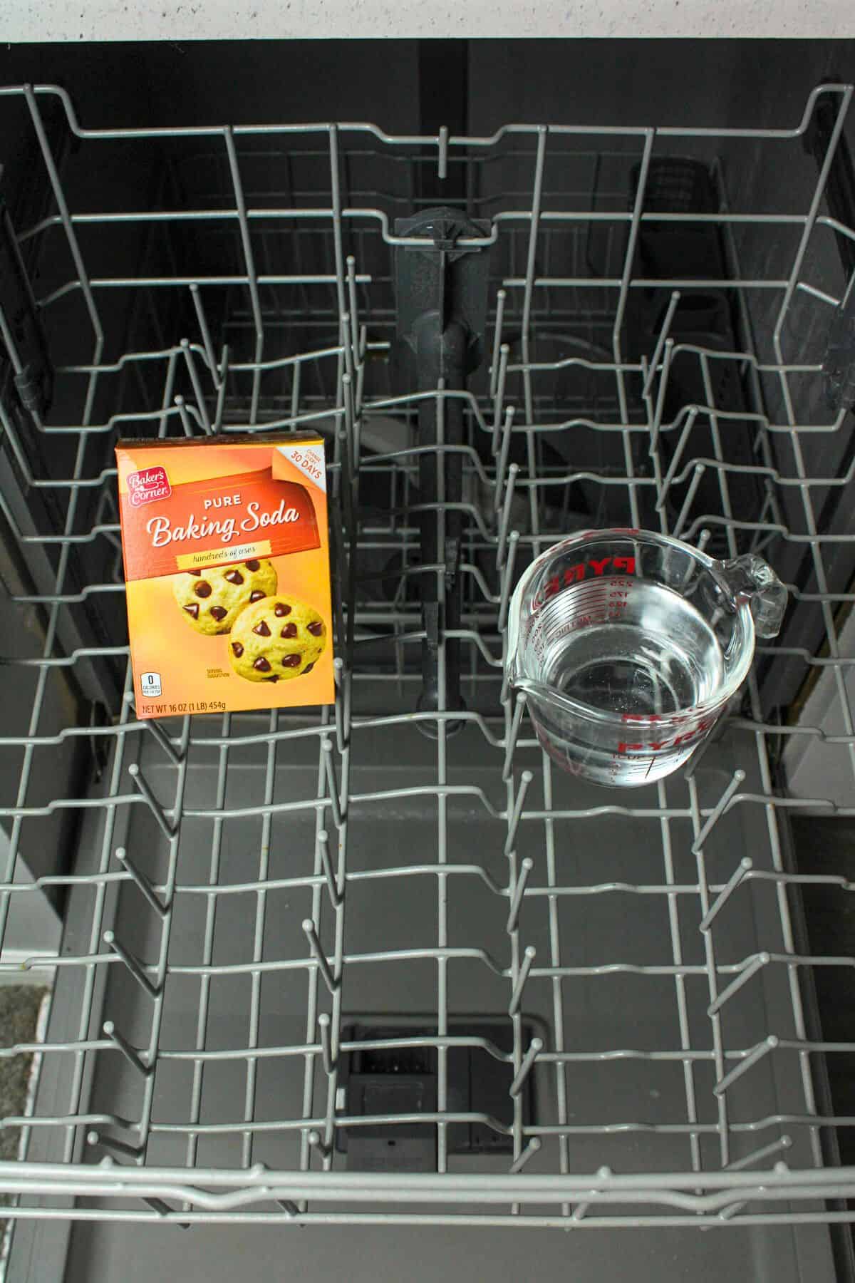 baking soda and vinegar on top rack of dishwasher.