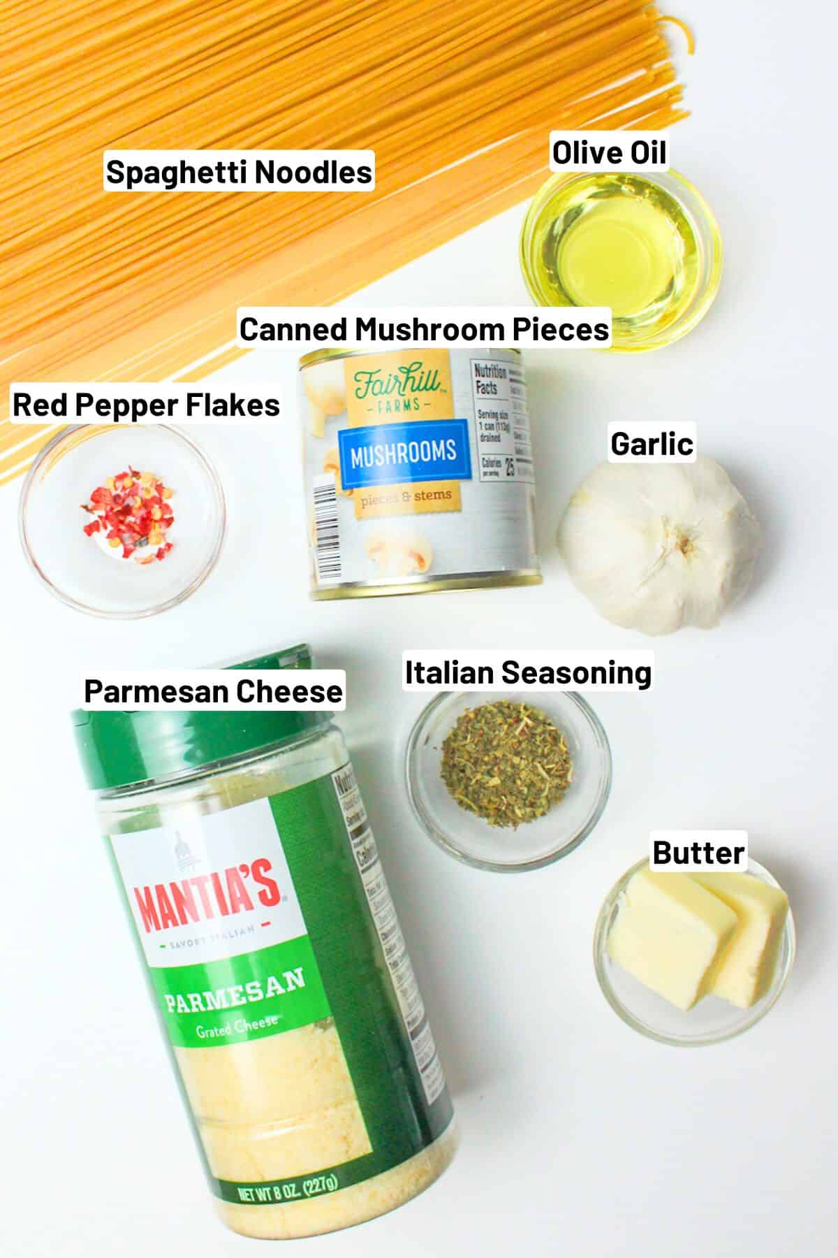 labeled ingredients needed to make mushroom garlic spaghetti.