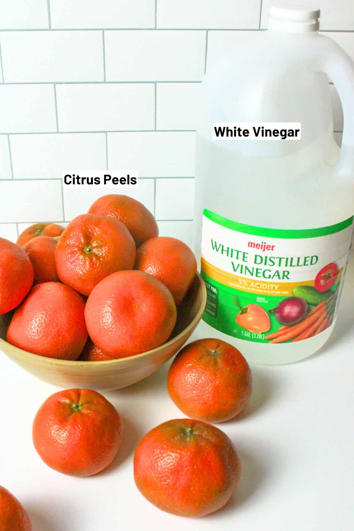 labeeled ingredients needed to make citrus all purpose cleaner.