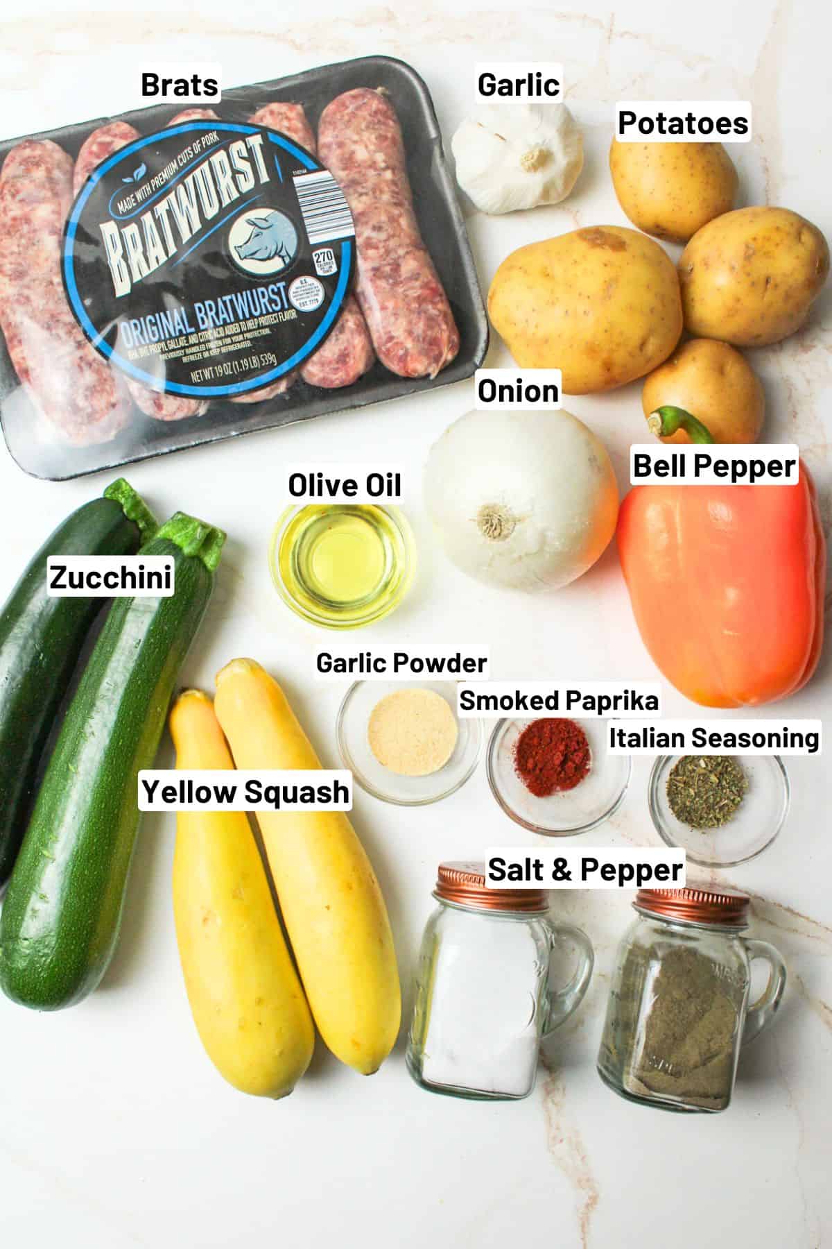 labeled ingredients needed to make bratwurst sheet pan dinner.