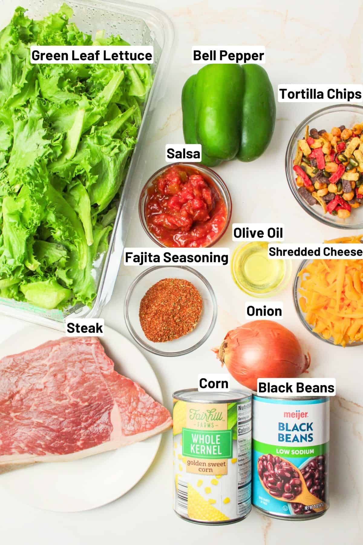 labled ingredients for fajita taco salad.