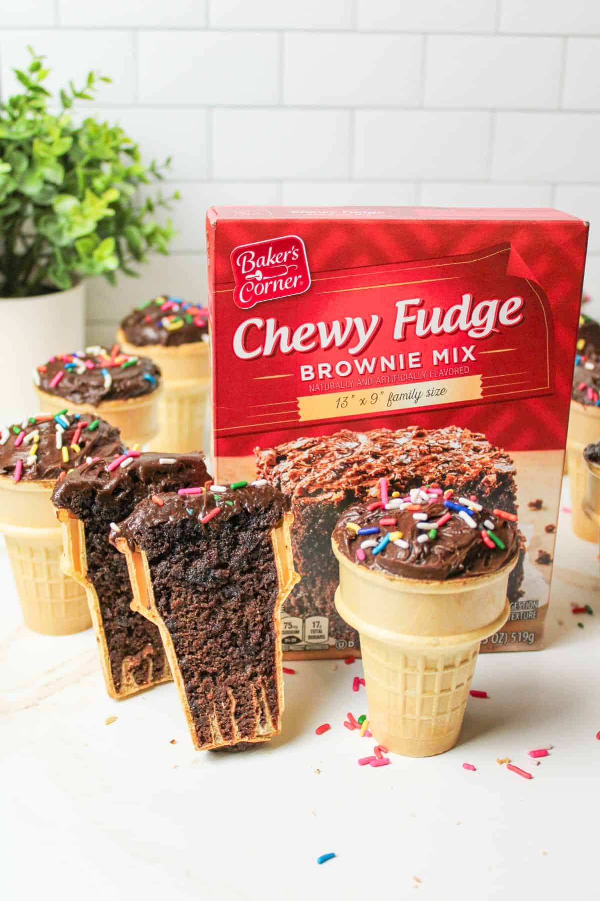 brownie cones in front of a box of brownie mix.