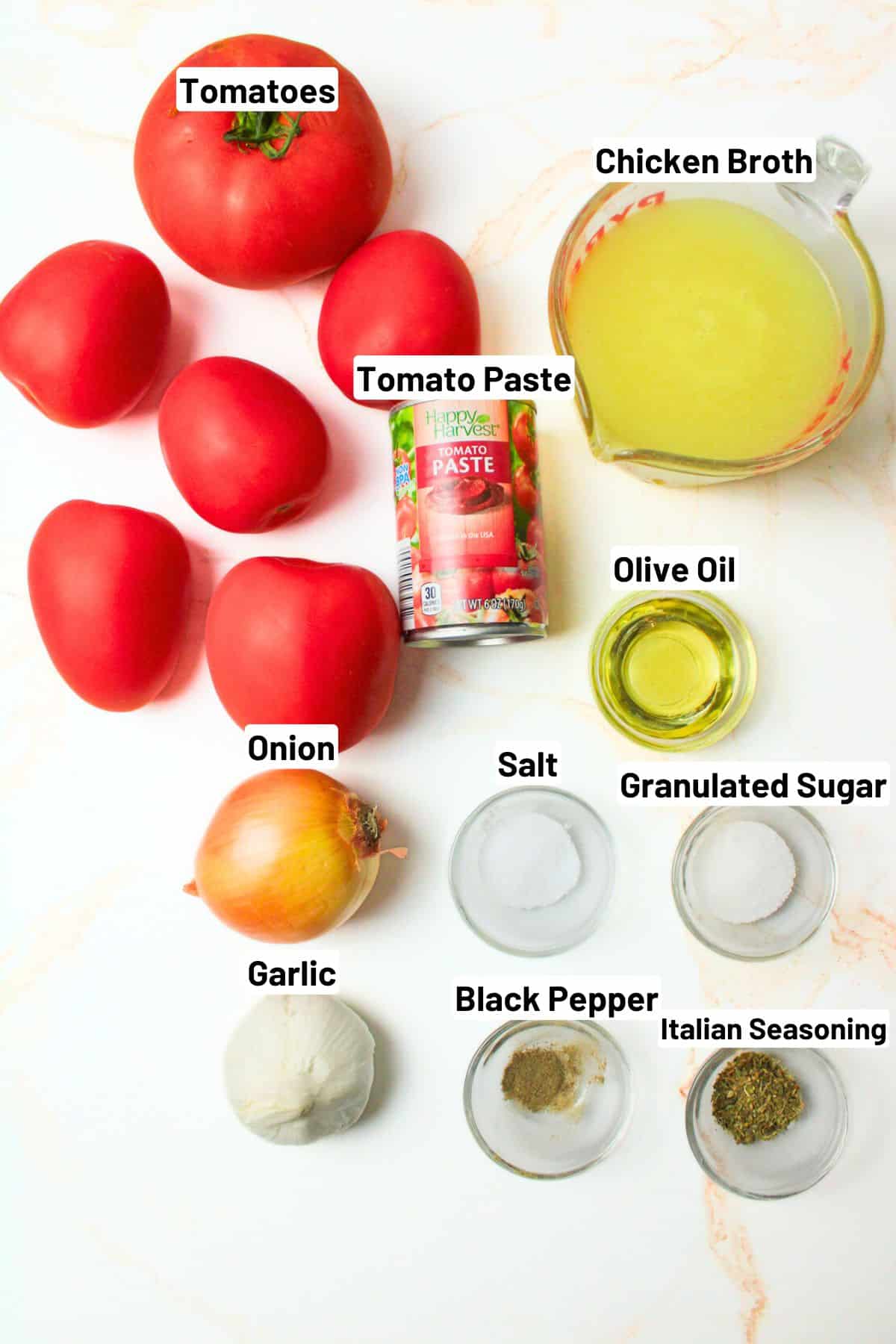 labeled ingredients for making roasted tomato and garlic soup.