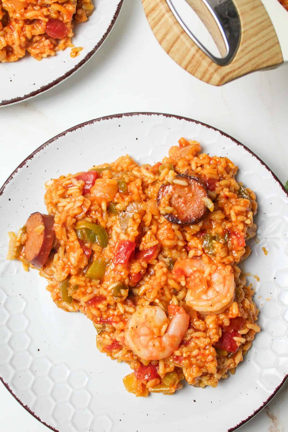 a plate filled with shrimp jambalaya.