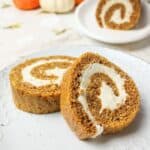 sliced soudough pumpkin roll on a plate.