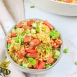 hot dog fried rice in a bowl.