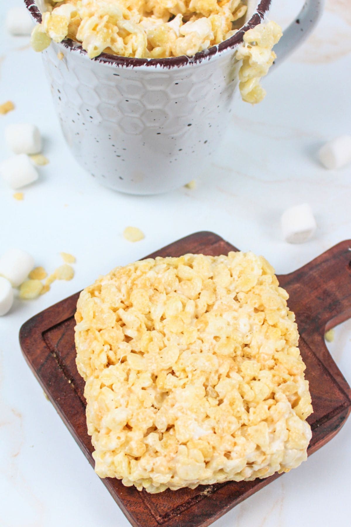 rice krispie treat square and in a mug.