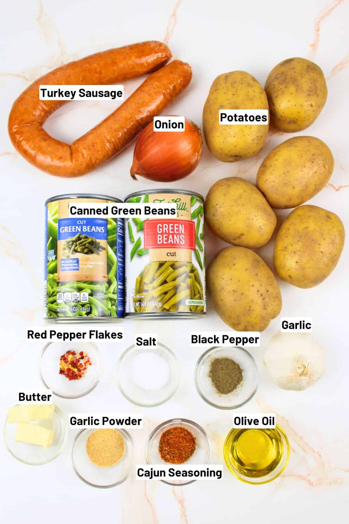 labeled ingredients needed to make sausage green bean potato casserole.
