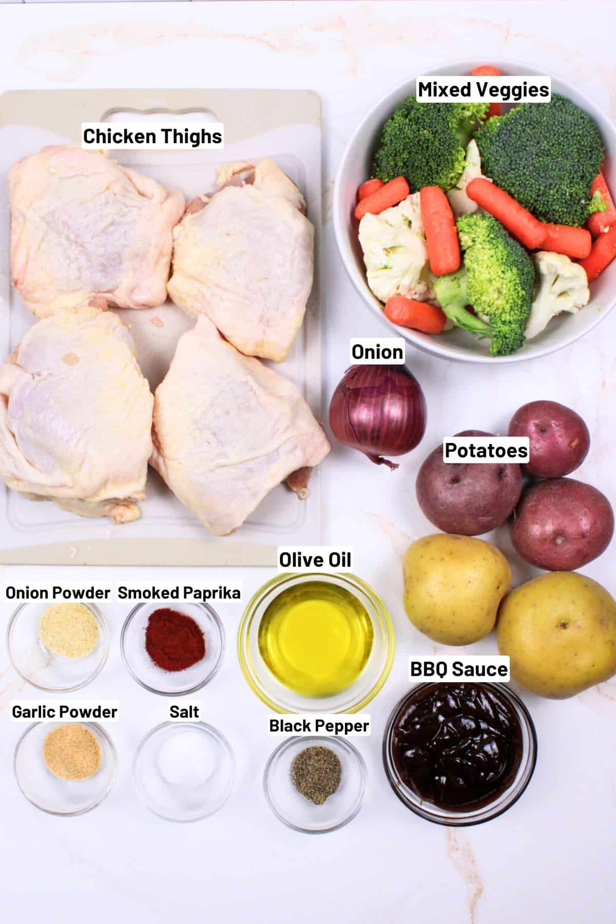 labeled ingredients needed to make bbq chicken sheet pan dinner.
