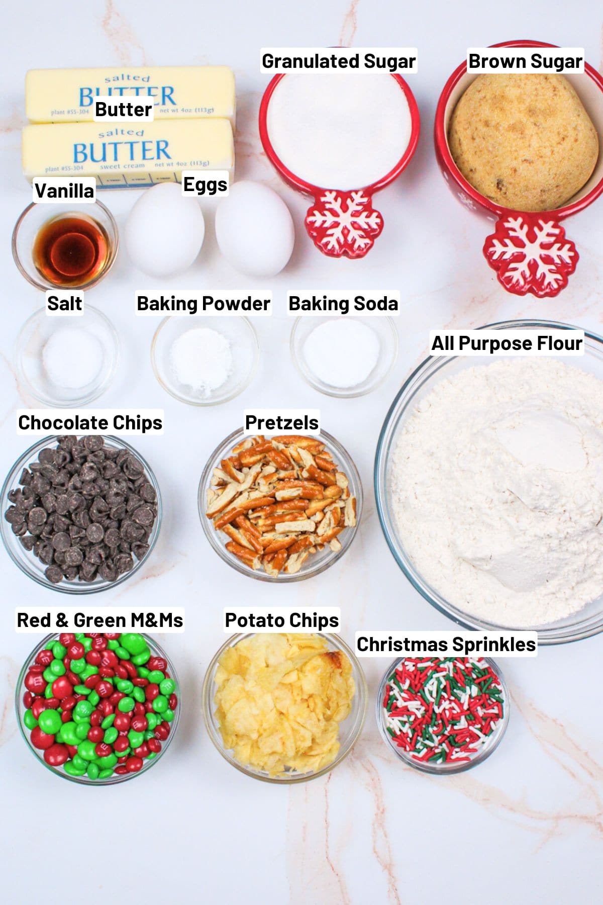 labeled ingredients needed to make christmas kitchen sink cookies.