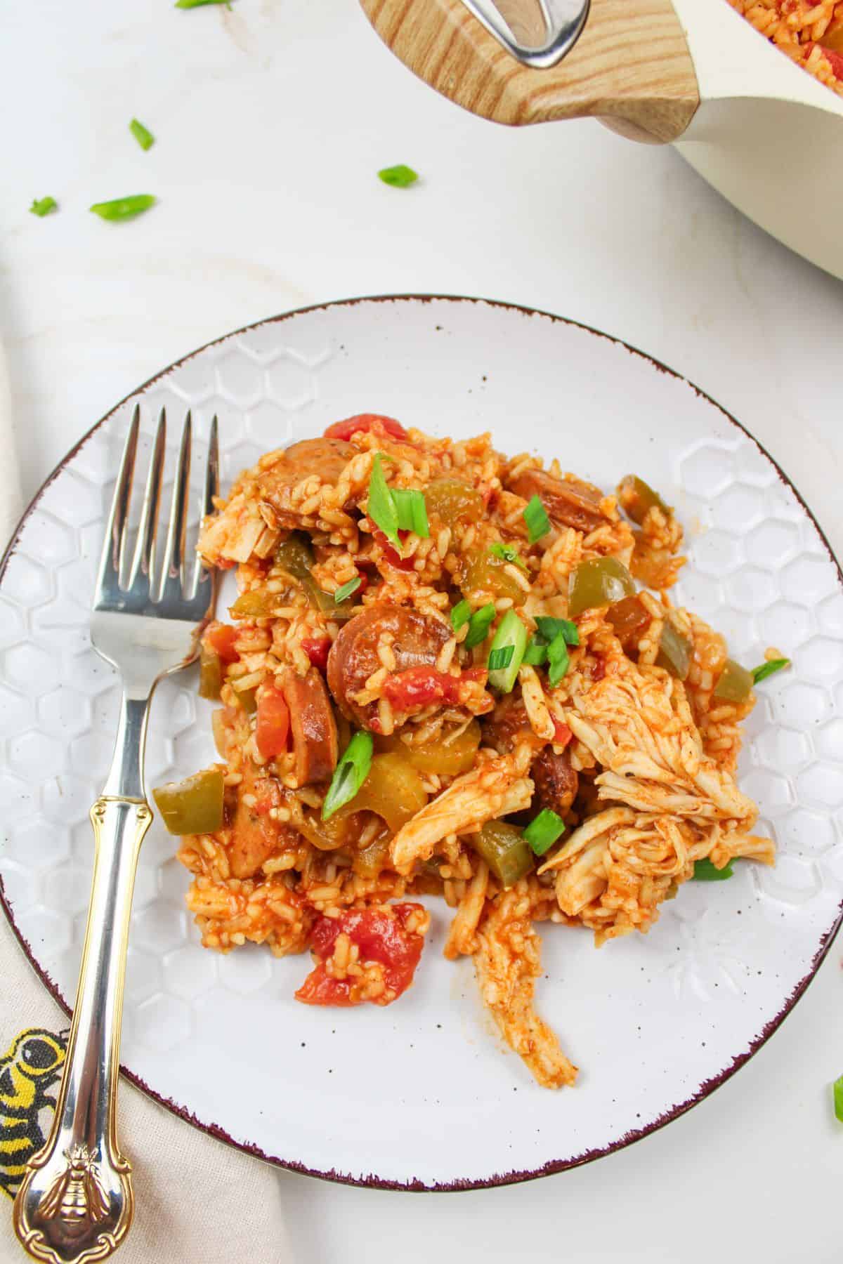 turkey jambalaya on a plate with a fork.